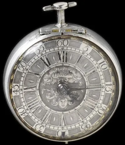 Silver watch movement with inner case, signed 'Sam Aldworth ye Strand', London, about 1700. Silver watch and pair case, signed 'Sam Aldworth ye Strand'. Engraved silver. — تصویر رکورد یوروپیانا