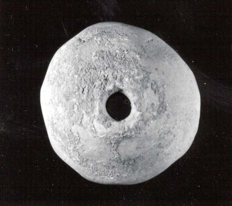 Spindle whorl — تصویر رکورد موزهٔ متروپولیتن (دسترسی آزاد)
