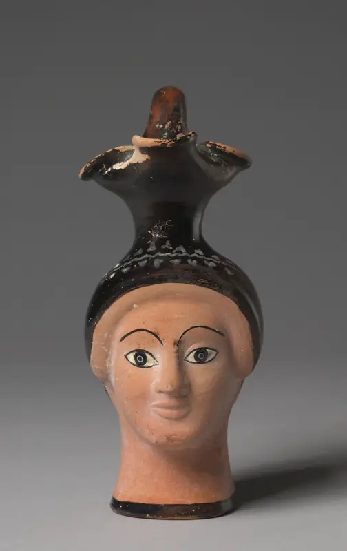 Oinochoe (Wine Jug) in the Form of a Woman's Head — تصویر رکورد موزهٔ هنر کلیولند (دسترسی آزاد)