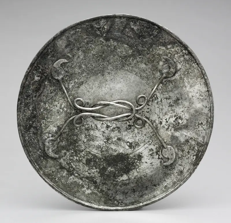 Mirror with a Handle in the Form of a Herakles Knot — تصویر رکورد موزهٔ هنر کلیولند (دسترسی آزاد)