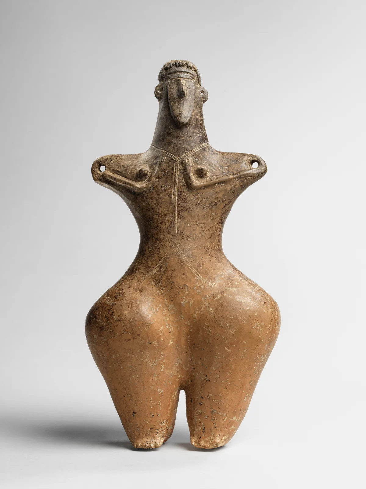 Statuette of a female — تصویر رکورد موزهٔ متروپولیتن (دسترسی آزاد)
