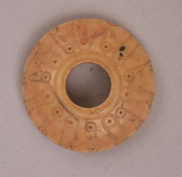 Button or Bead or Spindle Whorl — تصویر رکورد موزهٔ متروپولیتن (دسترسی آزاد)