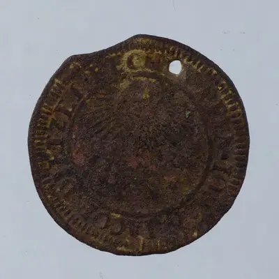 Tehnica: batere; Condițiile descoperirii: întâmplătoare; Muchia: netedă; Aversul: Legendă dispusă circular pe margine între un cerc perlat exterior și un cerc liniar interior. Central, soare, lună și  — تصویر رکورد یوروپیانا