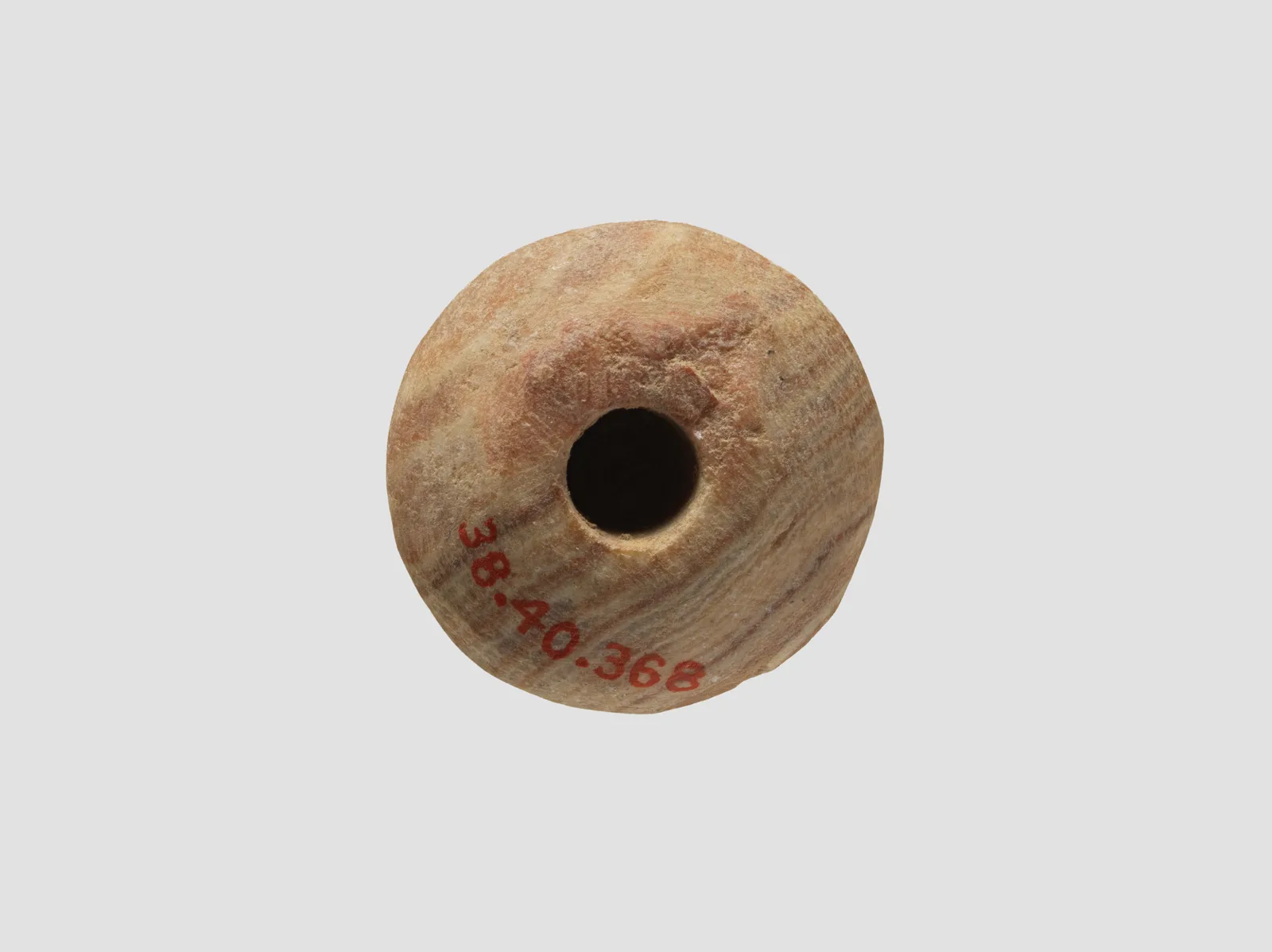 Spindle whorl — تصویر رکورد موزهٔ متروپولیتن (دسترسی آزاد) — شمارهٔ رکورد 38.40.368