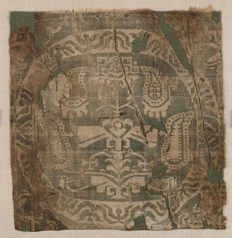 Roundel from a Tunic with Palmette Tree — تصویر رکورد موزهٔ هنر کلیولند (دسترسی آزاد)
