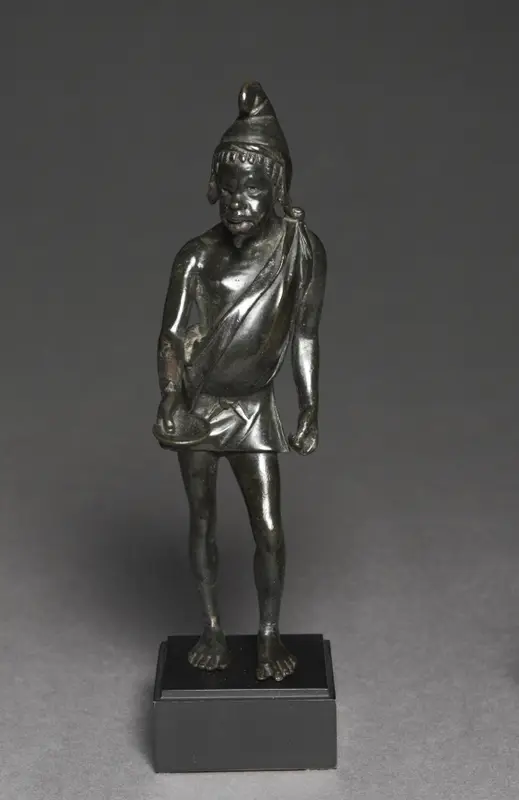 Statuette of a Black African Person — تصویر رکورد موزهٔ هنر کلیولند (دسترسی آزاد)