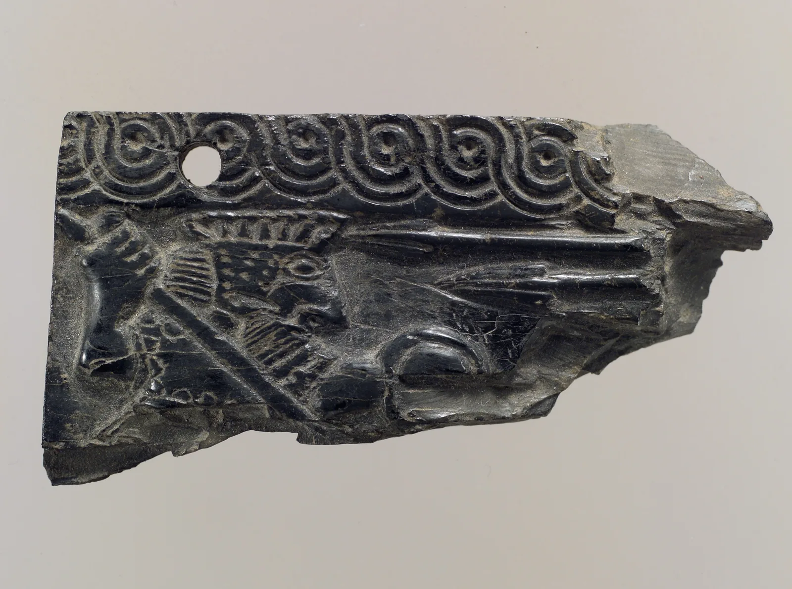 Furniture plaque carved in relief with warrior — تصویر رکورد موزهٔ متروپولیتن (دسترسی آزاد)