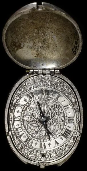 Watch with case of tulip form, silver parcel-gilt, the dial engraved, movement signed 'Henry Grendon at ye Exchange Fecit', England, London, about 1630. Watch with case of tulip form, silver parcel-gi — تصویر رکورد یوروپیانا