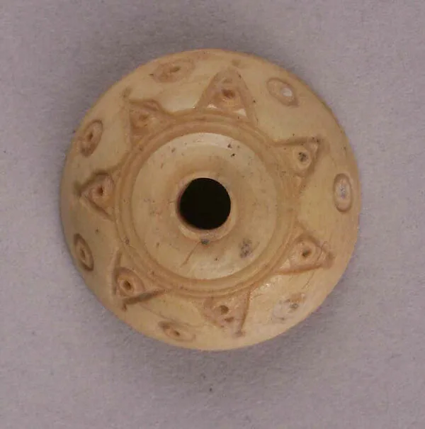 Spindle Whorl — تصویر رکورد موزهٔ متروپولیتن (دسترسی آزاد)