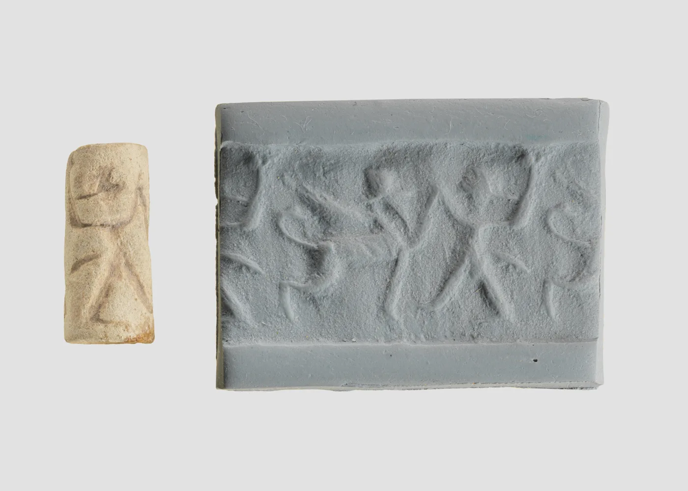 Cylinder seal with two-figure contest scene — تصویر رکورد موزهٔ متروپولیتن (دسترسی آزاد)