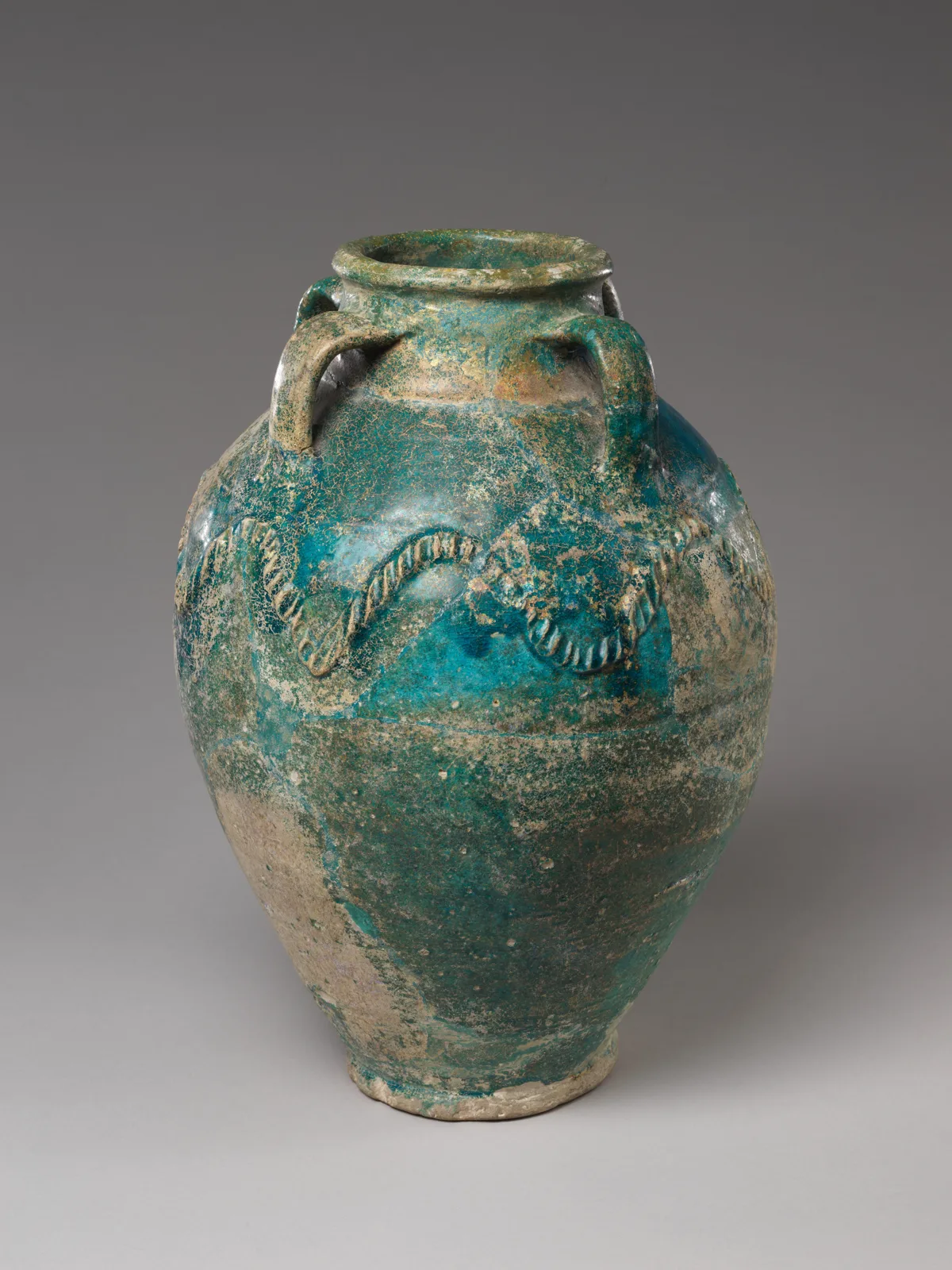 Four handled storage jar with rope-pattern design — تصویر رکورد موزهٔ متروپولیتن (دسترسی آزاد)