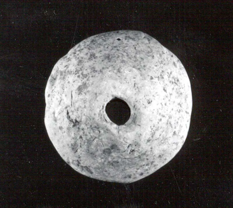 Spindle whorl — تصویر رکورد موزهٔ متروپولیتن (دسترسی آزاد)