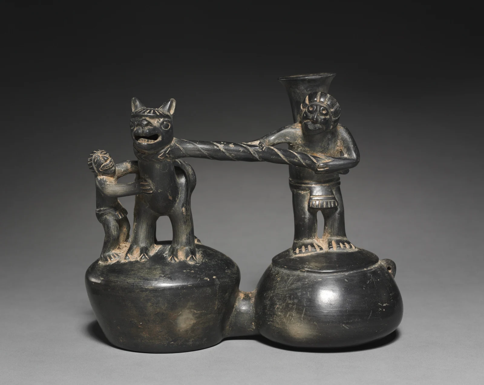 Double-chambered Vessel with Figures and Camelid — تصویر رکورد موزهٔ هنر کلیولند (دسترسی آزاد)