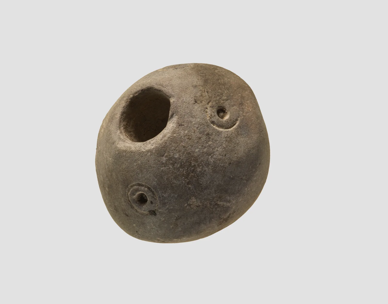 Spindle whorl — تصویر رکورد موزهٔ متروپولیتن (دسترسی آزاد)