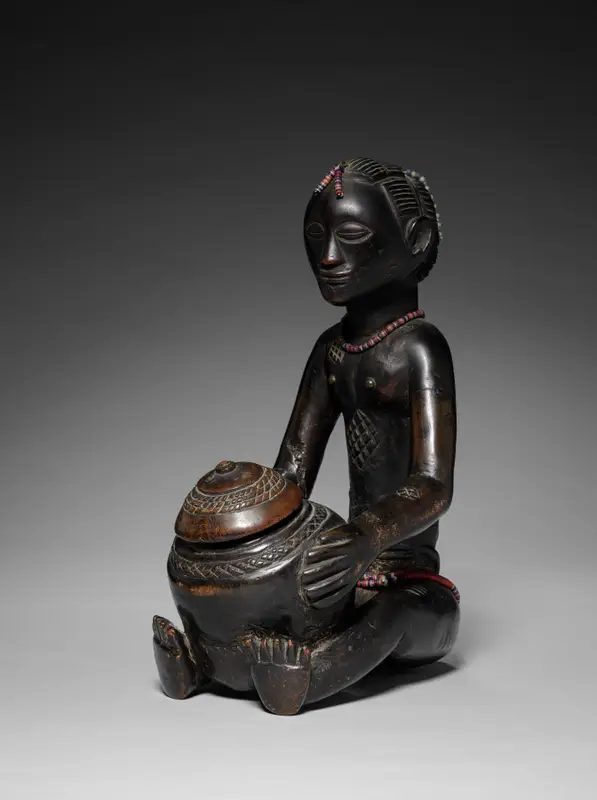 Female Bowl-Bearing Figure — تصویر رکورد موزهٔ هنر کلیولند (دسترسی آزاد)