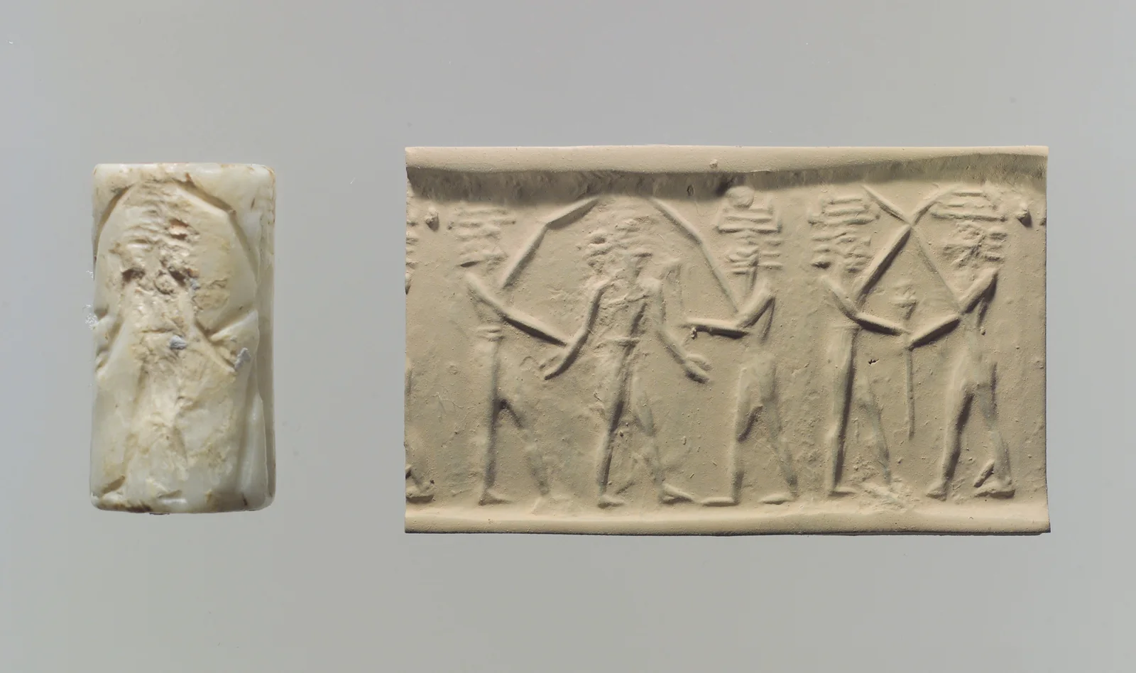 Cylinder seal and modern impression: battle of the gods — تصویر رکورد موزهٔ متروپولیتن (دسترسی آزاد)