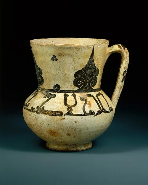 Ewer with Arabic Proverb, "Devotion Fortifies Action" — تصویر رکورد موزهٔ متروپولیتن (دسترسی آزاد)