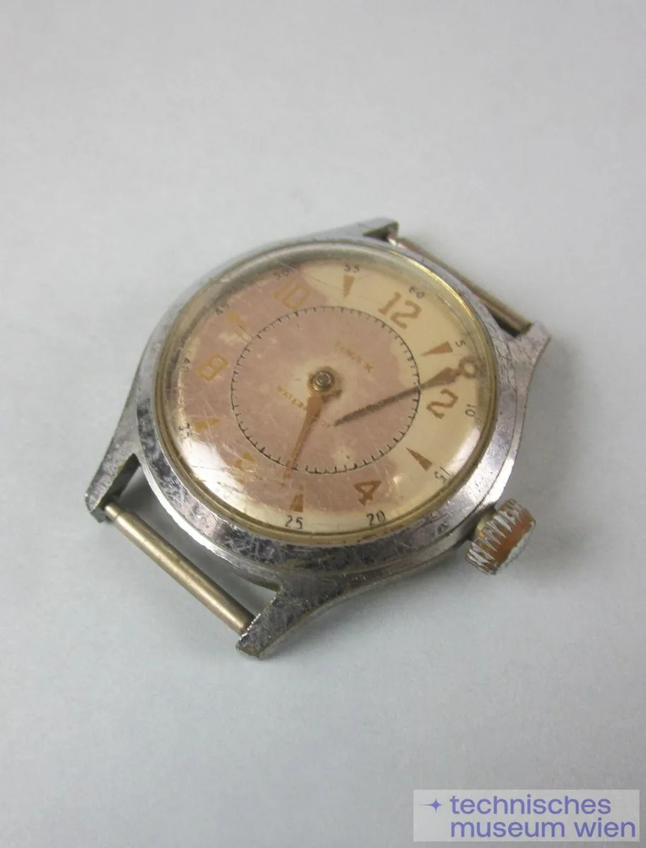 Herrenarmbanduhr, Stiftenankergang, Wippenaufzug - "Timex" — تصویر رکورد یوروپیانا