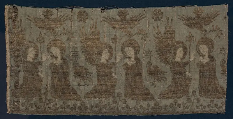 Textile Fragment with the Annunciation — تصویر رکورد موزهٔ هنر کلیولند (دسترسی آزاد)