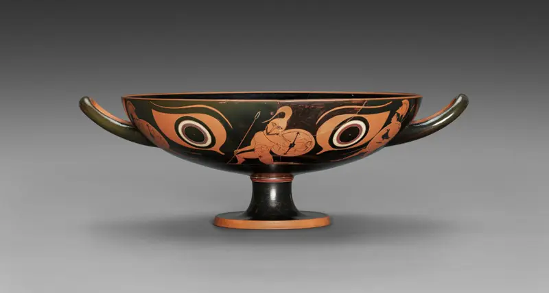 Red-Figure Eye Cup: Warriors (A), Musician and Youths (B) — تصویر رکورد موزهٔ هنر کلیولند (دسترسی آزاد)