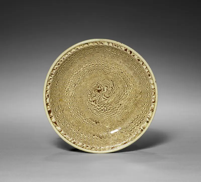 Flat Dish Made of Marbled Clay — تصویر رکورد موزهٔ هنر کلیولند (دسترسی آزاد)