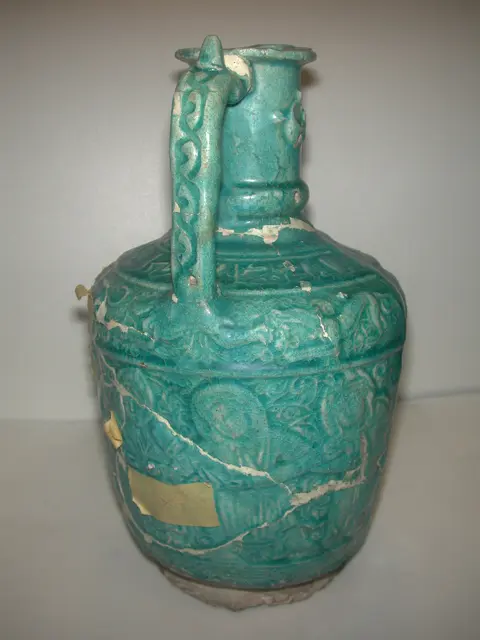 Ewer with Molded Inscriptions, Animals, and Dancers — تصویر رکورد موزهٔ متروپولیتن (دسترسی آزاد)