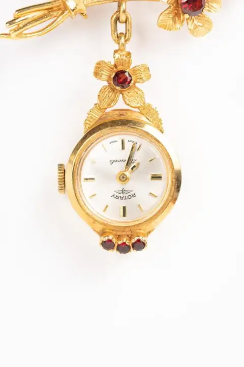 Vintage Roundabout 9 CT Gold Watch Floral Brooch – 1968 — عکس ۵ از رکورد آرشیو WatchMuseum