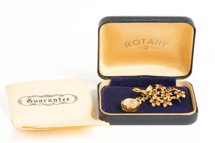Vintage Roundabout 9 CT Gold Watch Floral Brooch – 1968 — عکس ۶ از رکورد آرشیو WatchMuseum