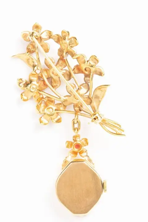Vintage Roundabout 9 CT Gold Watch Floral Brooch – 1968 — عکس ۸ از رکورد آرشیو WatchMuseum